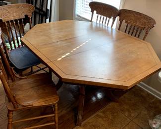 #53	oak pedestal  table with 1 leaf and 4 chairs as is finish 44-56x44x30	 $125.00 			
