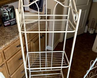 #29	white metal  3 shelf baker rack 20x13x53	 $45.00 			
