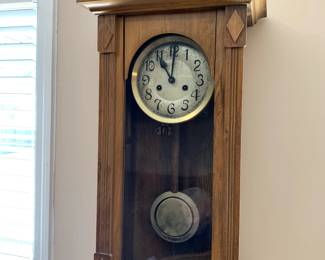 #52	wall clock as is wood with key 13x7x31	 $75.00 			
