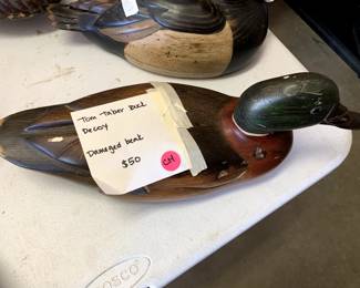 #131	Tom Taber's duck decoy damaged beak 	 $50.00 			
