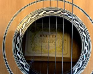 #104	vintage Suzuki guitar neck strap 	 $65.00 			
