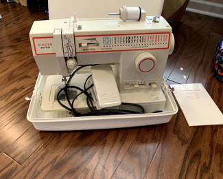 #28	Singer 4552 sewing machine with peddle	 $75.00 			
