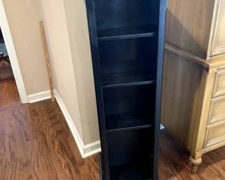 #19	black swivel laminate bookcase with 3 shelves 16x16x49	 $75.00 			
