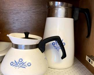 #125	blue flower Pyrex coffee and 2 pot set 	 $30.00 			
