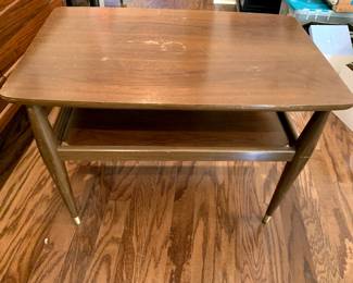 #18	mid century wood table with 1 shelf 30x19x22 as is finish 	 $45.00 			
