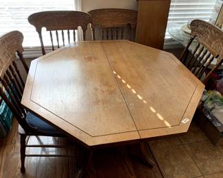 #53	oak pedestal  table with 1 leaf and 4 chairs as is finish 44-56x44x30	 $125.00 			
