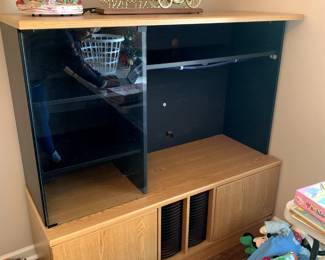 #8	entertainment center laminate 2 doors and 1 glass door 53x20x52	 $30.00 			
