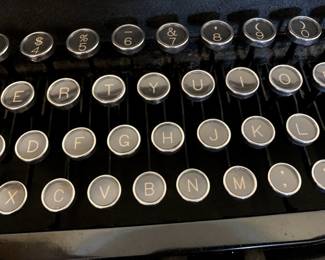 #119	Royal vintage typewriter in case	 $30.00 			
