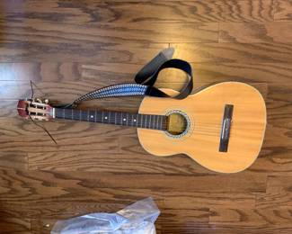 #104	vintage Suzuki guitar neck strap 	 $65.00 			
