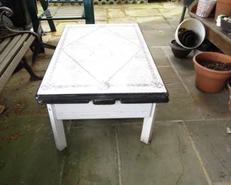 Enamel table (legs were chopped off to make this a coffee table)