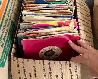 Lot of Old 45 records. Great for listening or art  projects.