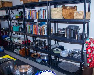 Assortment of books, pots and pans, baskets