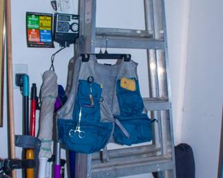 Fisher vest and ladder