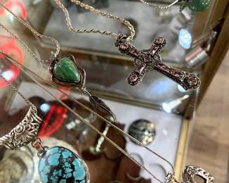 A lot of religious jewelry.  There is a pendant here, Our Lady of the Guadalupe, and I love it.