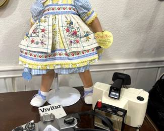 Look at that cutie, and she's got her cameras with her.