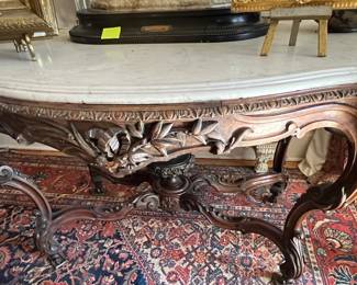 52. Antique Marble Top Table w/ Carved Base on Casters (58" x 38" x 30")
