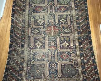 151. Antique Rug (56" x 39")
