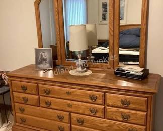 Dresser with tri-fold mirror