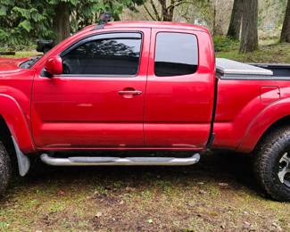 2009 Manual Toyota Tacoma, 150k miles. Selling for $13,995.