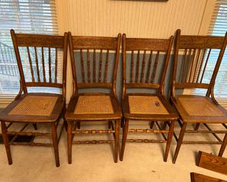 4 more spindle back cane bottom chairs