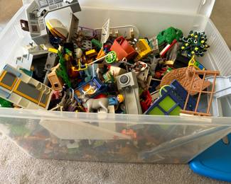 Several tubs of Playmobile