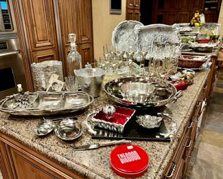 Large kitchen with a large selection of Arthur Court pewter, Elephant pewter tumblers, and Michael Adam.
