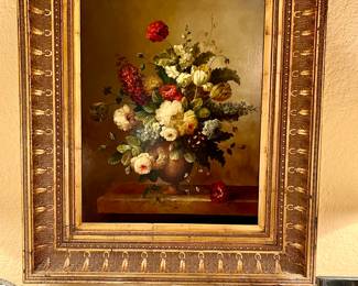 Lovely floral oil painting.  The frame is outstanding.