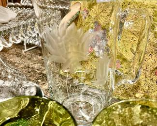 Beautiful etched hand blown glass pitcher.
