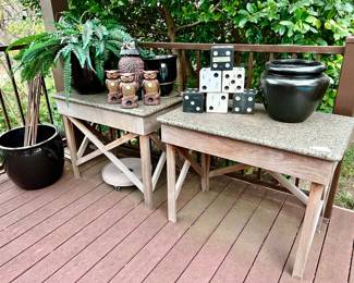 Pair of granite topped wooden tables.