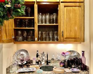 Fantastic bar with Arthur Court pewter, purple stems, and TCU longitude latitude double old-fashions.