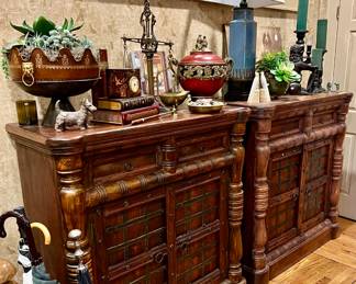 Stand out pair of cabinets with a Santa Fe look.