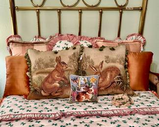 Sweet brass headboard/footboard.  Mattress not for sale.  Notice the Aubusson rabbit pillows.