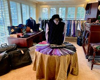 Men's Upscale Boutique including Coach, TUMI, Hermes, Zegna, Brioni.