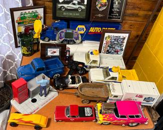 More toy trucks, plaques... NOTE in the left corner you have a SNAP-ON "Nobody even comes close" Miniature Tool Storage Bank Diorama... and it talks!!