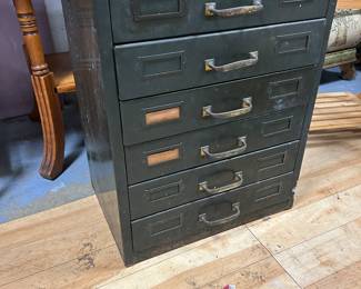 A 6 drawer metal organizer.