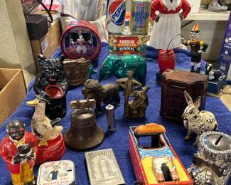 What a GREAT group of BANKS!! Including Pop Eye Dime bank, 1989 Metal Can  Container(MCC) Fort Atkinson Grand Opening w/ 116 original employees listed on the back of the can!!, 1934 Century of Progress Chicago, Ethnic, Gave for a Rainy Day duck, rabbit, black bear, lion, Gar the elephant, hippo, Lenard baby shoe, Park Sherman dresser, Mutt & Jeff, Dog Trick (w/ clown), B & R dime bank, French Can-Can Musical, Nestles, Pepsi and more...                                 Uncle Sam and Farmers & Merchants Bank Jefferson, WI. (last two are NOT on this pic.)