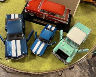 1957 Chevrolet nomad on display board (Mercari), 1957 shell, Belair, 
1970 SS 454 Chevelle (Ertl)