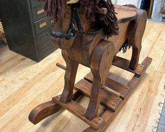Child's wood rocking horse