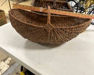 A  large ~20” wide buttocks basket