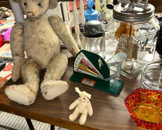 On the left you have a ~20" tall Steiff Mohair Teddy Bear, an egg scale, a glass cigar humidor, #40 Daisy Churn (and don't forget the Easter eggs on the bottom!)