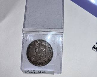 The 1827 Bust half dollar with the 'square base' bottom of the 2 in the date .