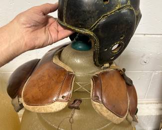 circa 1920's Rawlings football helmet and (unknown maker) shoulder pads