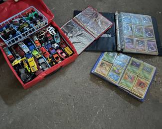 selection of Hot Wheels and a couple folders FULL of Pokemon trading cards!!