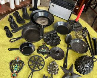 Wagner fry pan, other fry pans, trivets, cobblers shoes and support, match holder and more...