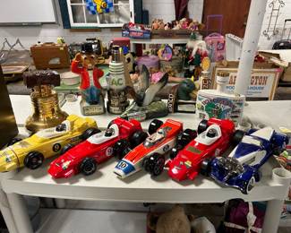 various liquor decanters - race cars, liberty bell, Wisconsin, automobile, AC, Ducks Unlimited & more