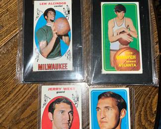 GRADED/CERTIFIED 1969-70 Rookie Lew Alcindor, GRADED/CERTIFIED 1970-71 Rookie 'Pistol' Pete Maravich, 1969-70 Jerry West & 1970 - 1971 Jerry West Topps Basketball trading cards.