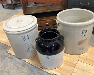 Double birch leaf 10 gal crock, 10 gal lid (lid will be sold separately), 5 gal two tone 'jar', 12 gal Red Wing crock.