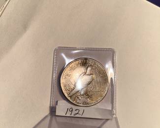 The reverse of the 1921- P  Peace Dollar.