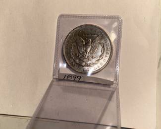 The reverse of the 1899-P Morgan Dollar