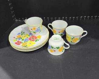 Rubel and Co in bloom 3 plates and 4 cups